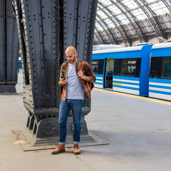 man-subway-using-smartphone
